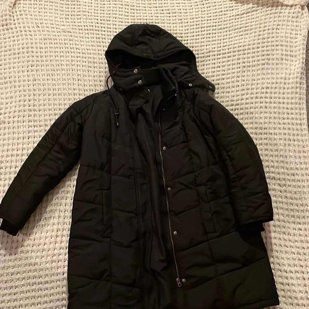Black puffy maternity coat, with hood.